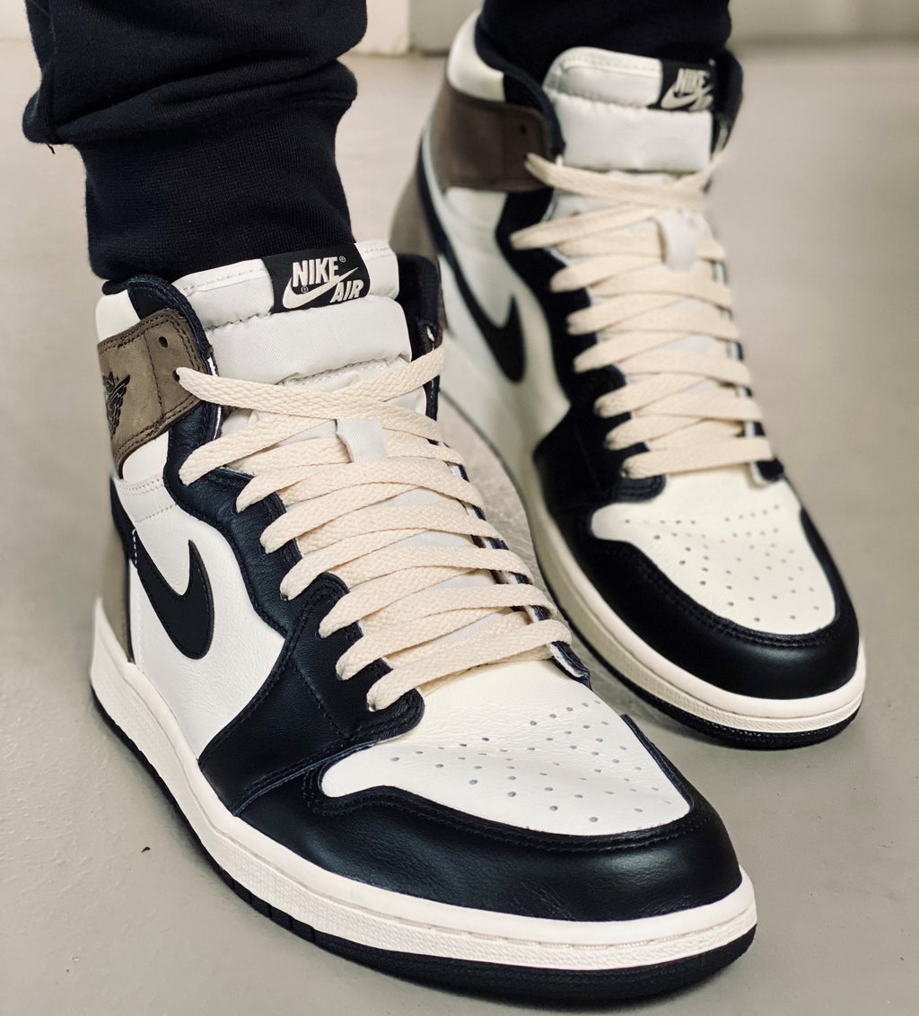 You need to be putting on cream/sail laces on your Retro Jordan's and Dunks